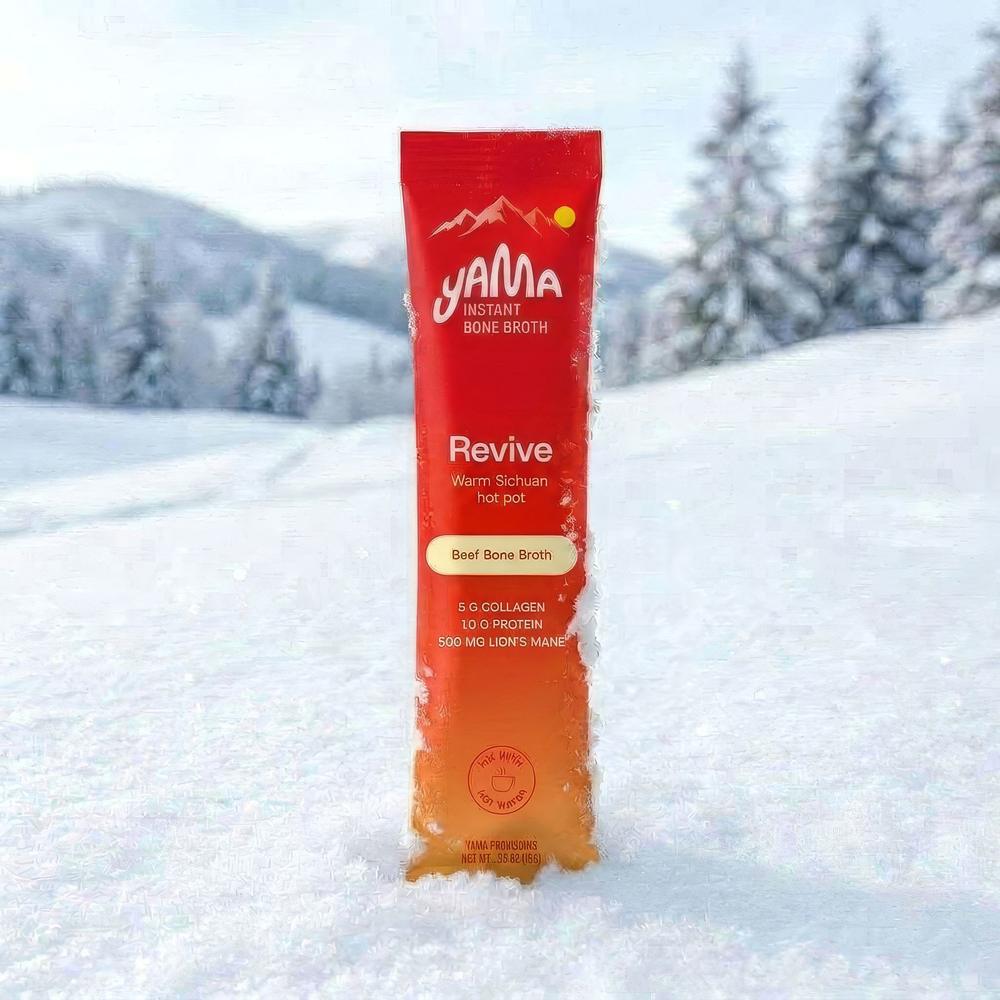 Revive stick pack standing in snow