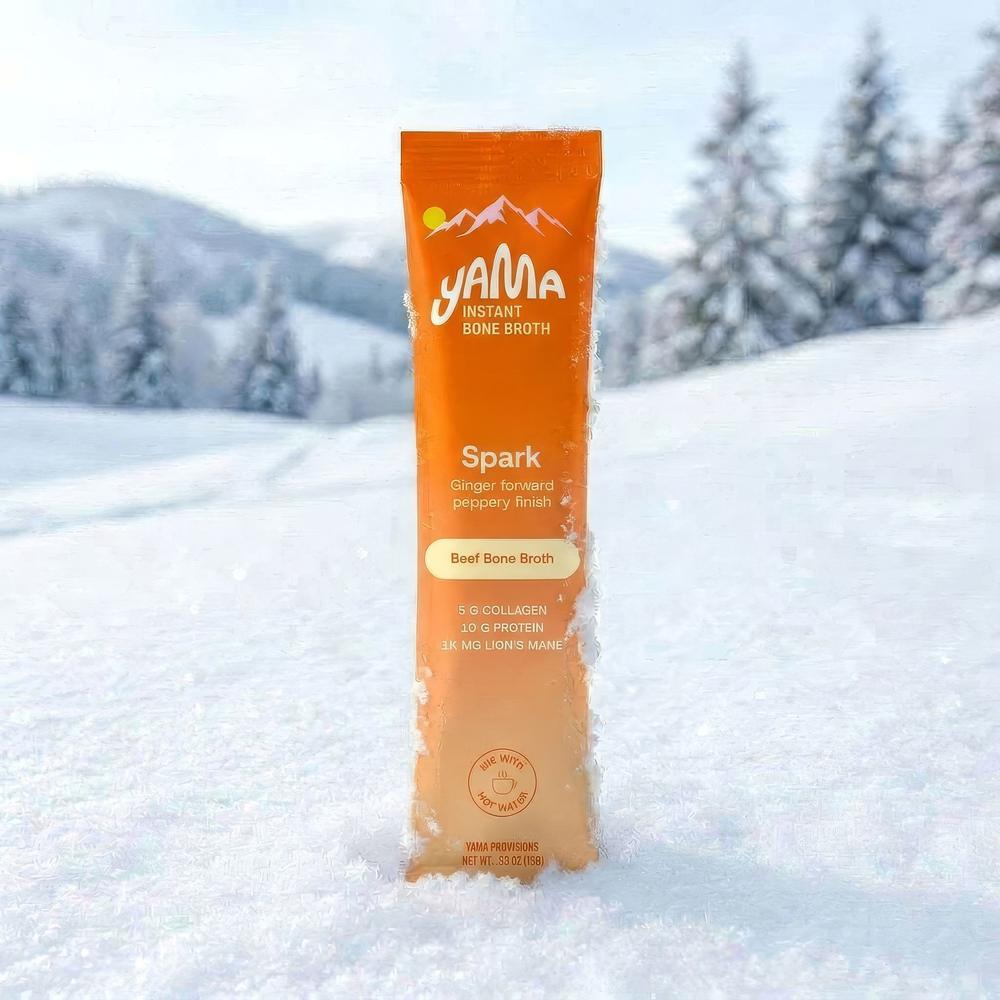 Spark stick pack standing in snow